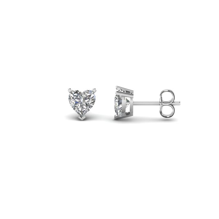 The pair of half carat stud earrings portrays two perfectly carved heart shaped diamonds of 0.50 carat total weight, H color, VS2 clarity in prong setting.Number of diamonds- 2.Direct manufacturing price.Professionals of medical field, lawyers, government employees, military men and university staffs can gain a discount of 5% at purchase of any jewelry. (Refer to discounted jewelry page)30 days easy return policy.Conflict free natural diamonds.Along with these lovely earring studs, own an endearing diamond religious pendant fused with panache. 1 Carat Diamond Earrings, Carved Heart, Heart Shaped Earrings, Heart Shaped Diamond, Platinum Metal, Lovely Earrings, Best Diamond, Heart Studs, Heart Earrings Studs