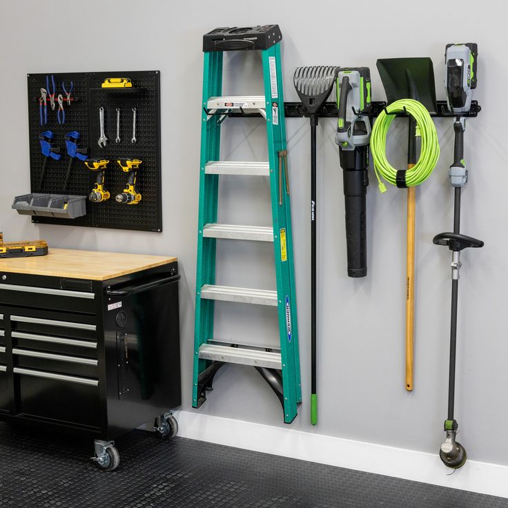 organized garage Single Car Garage Organization, Storage For Cleaning Supplies, Small Garage Storage, Single Car Garage, Broom Storage, Garage Racking, Garage Organizer, Storage Shed Organization, Utility Closet