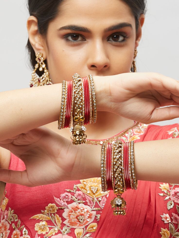 These fancy stone bangles are a perfect accessory for any of your Indian outfits Traditional Indian Jewelry:Slight Color variations are possible due to lighting and photography. If you are interested in purchasing this item and have any additional questions about this item, please feel free to email us at nazranaanj@gmail.com. For faster responses, call us at 732-283-1808 or WhatsApp us at 609-852-9922 Care instructionsKeep Jewelry away from direct heat, water, perfumes, deodorants and other str Stone Work Jewelry For Navratri Party, Jeweled Bracelets For Diwali, Festive Hand Set Bangle For Party, Festive Jeweled Bracelets For Diwali, Adjustable Kundan Bangle, Festive Bollywood Bangle With Latkans, Bollywood Style Bangle With Latkans As A Gift, Stone Work Bracelets For Diwali Puja, Heavy Bracelets For Diwali Party