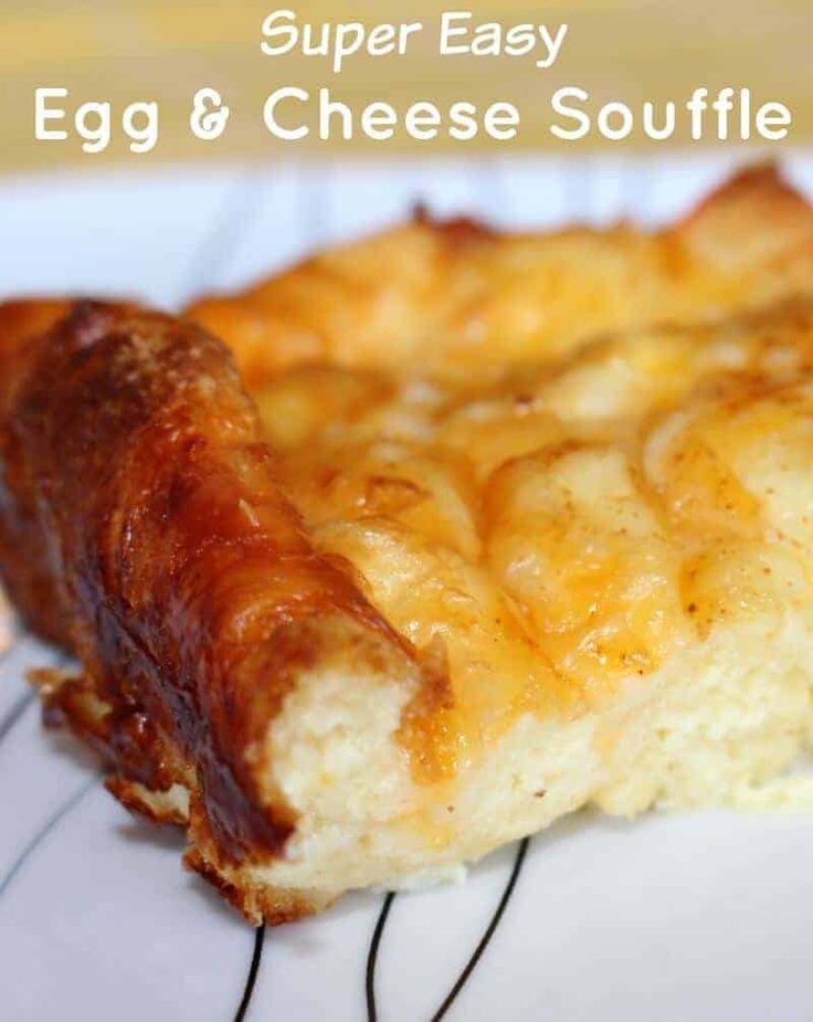 an egg and cheese souffle on a plate with the words, super easy egg & cheese souffle