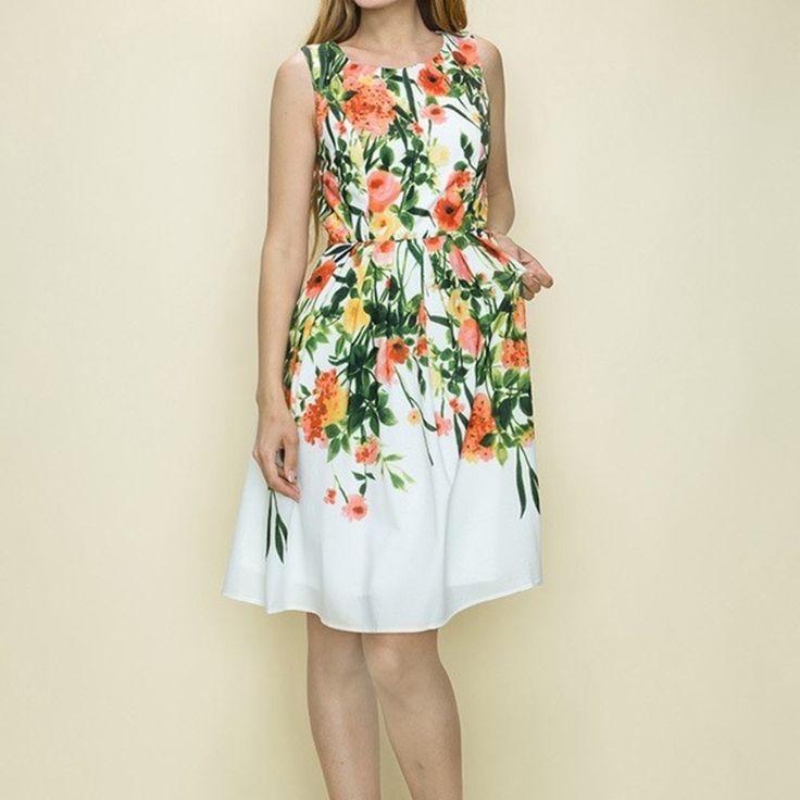 This Floral Dress Makes A Statement! Ink Print On Liverpool Fabric, Sleeveless, Round Neckline, Pleated Skirt And Back Zipper. Dress Is Fully Lined. 100% Polyester Machine Wash Imported Summer A-line Sleeveless Dress With Pleated Waist, Floral Print A-line Sleeveless Sundress, Multicolor A-line Sleeveless Dress With Floral Print, Spring A-line Sleeveless Dress With Pleated Waist, Sleeveless A-line Dress With Pleated Waist For Spring, A-line Sleeveless Dress With Pleated Waist For Spring, A-line Sleeveless Dress With Pleated Waist For Summer, Spring Floral Print A-line Sleeveless Dress, Spring Printed Sleeveless Midi Dress