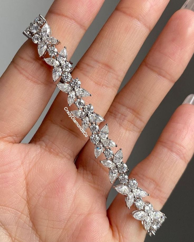 Pear, Marquise & Round Cut Colorless Moissanite Diamond Bracelet, Flower Shape Tennis Wedding Bracelet, Lab Diamond 14k White Gold Bracelet ✹✹𝐖𝐞𝐥𝐜𝐨𝐦𝐞 𝐭𝐨 𝐂𝐫𝐚𝐳𝐲𝐃𝐢𝐚𝐦𝐨𝐧𝐝𝐬𝐂𝐨✹✹ Detail about stones Moissanite & Simulated Stone: ----------------------------- Stone Shape: Pear , Marquise & Round Cut Stone Size: 5X3 mm, 6X3 mm & 3.50 mm  Weight: 27.25 TCW Color: Colorless Cut: Excellent Clarity: VVS Lab-Grown Diamond : ----------------------------- Stone Shape: Pear , Marquise & Ro Fine Jewelry Diamond Bracelets For Wedding, Wedding Diamond Bracelets With Brilliant Cut, Wedding Diamond Bangle Bracelet With Prong Setting, Wedding Bangle Diamond Bracelet With Prong Setting, Wedding Diamond Bangle With Prong Setting, Elegant Diamond Flower Bracelet, Wedding Diamond Bracelets With Prong Setting, Exquisite Diamond White Wedding Bracelets, Exquisite Diamond White Bracelets For Wedding