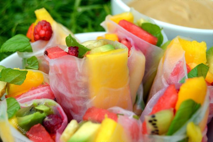 fruit wrapped in paper and garnished with mint leaves