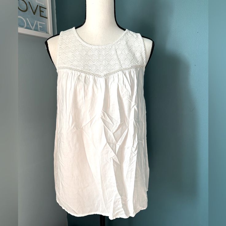 Brand New Old Navy Size Small White Sleeveless Shirt Has Pretty Embroidery On The Chest. Armpit To Armpit Is 17 Inches Laying Flat Length Is About 25 Inches Tags Still Attached! Smoke-Free/Dog Friendly Home Bundle Items Together And Save On Shipping! Casual Embroidered Top For Summer Daywear, Spring Sleeveless Cotton Blouse, White Sleeveless Embroidered Top For Beach, Casual White Sleeveless Embroidered Top, Sleeveless Cotton Blouse For Vacation, White Sleeveless Embroidered Top For Summer, Summer Sleeveless Embroidered Cotton Top, Casual Sleeveless Embroidered Top For Summer, Cotton Tank Blouse For The Beach