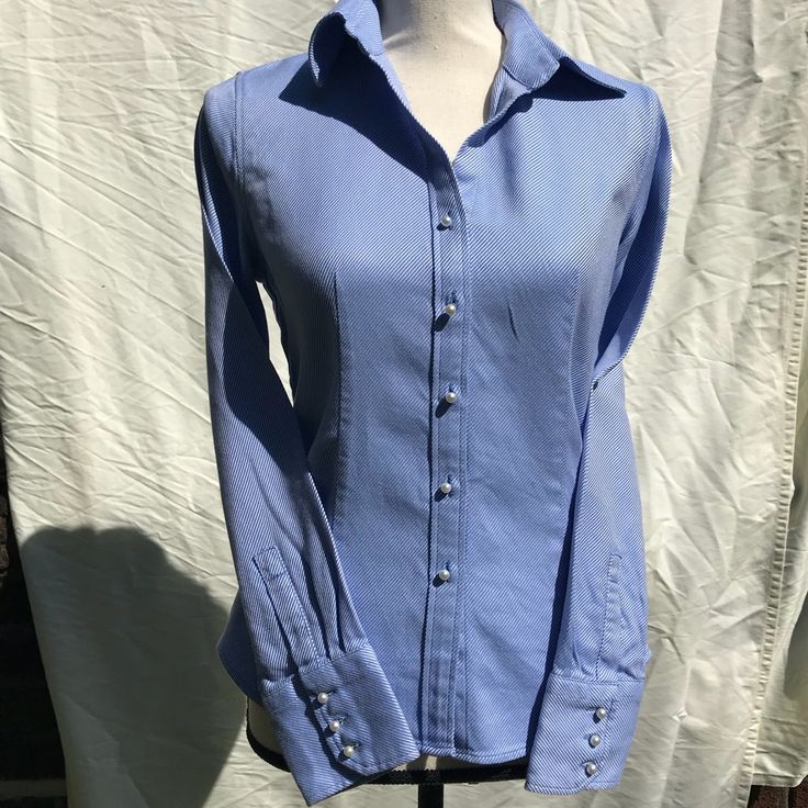 A True Modern Classic. This Talbots Crisp White And Oxford Blue Striped Button-Down Has Pretty Pearl Buttons For Polish. Classy And Sophisticated, This Top Is Perfect For Any Professional Setting; Especially Interviews! Excellent, Never Worn, New Without Tags, Size 2. Smoke Free Home! 100% Cotton Please See Last Picture For Measurements! Fitted Collared Tops With Pearl Buttons, Fitted Workwear Tops With Pearl Buttons, Fitted Tops With Pearl Buttons, Fitted Tops With Pearl Buttons For Work, Fitted Blue Top With Button Cuffs, Fitted Blue Tops With Button Cuffs, Formal Fitted Tops With Pearl Buttons, Fitted Blue Tops With Snap Buttons, Fitted Light Blue Tops With Button Closure