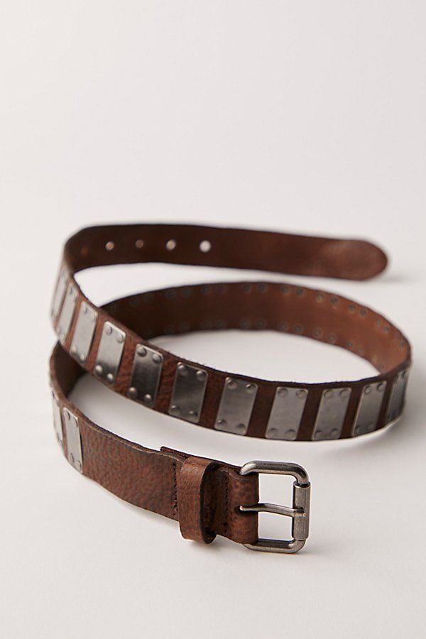 Add the coolest touch to your accessories collection with this head-turning belt featured in a luxe leather fabrication with metal panel detailing throughout for an extra edgy finish. | Stroke Of Midnight Belt by Free People in Brown, Size: S/M