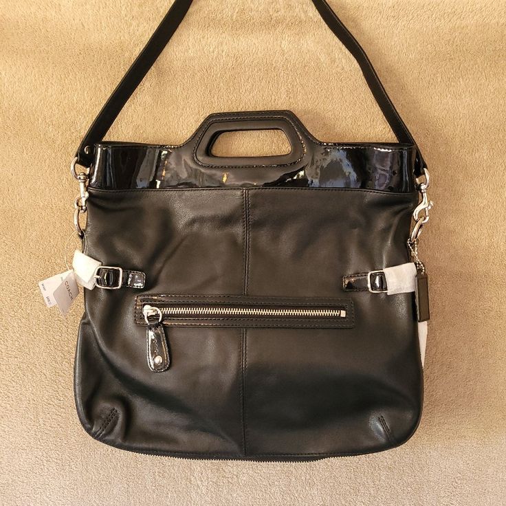 New Vintage Coach "Bonnie" Black Leather Fold-Over Bag. 100% Authentic. Beautiful Soft Leather With Patent Leather Accents. So Many Amazing Things About This Purse In A Classic And Sophisticated Style. The White Tissue Covering Items In Certain Photos Is Still The Original Wraps To Protect Hardware And Leather Details. Features Snap Top Opening, Shoulder Strap That Can Be Removed And Purse Can Be Carried By The Handle As A Satchel (Very Multi-Functional), Silver Hardware, Exterior Zippered Pocke Coach Shoulder Bag With Detachable Strap For On-the-go, Designer Soft Leather Satchel Tote, Leather Shoulder Bag With Silver-tone Hardware For On-the-go, Leather Satchel With Silver-tone Hardware, Black Leather Bag With Silver-tone Hardware, Designer Soft Leather Satchel For Shopping, Coach Hobo Bag With Adjustable Top Handle, Coach Hobo Bag With Top Handle And Adjustable Strap, Leather Bags With Palladium Hardware And Double Handle