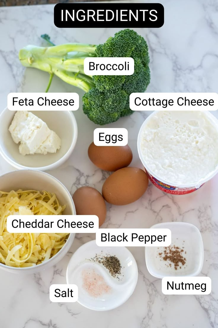 ingredients to make broccoli alfredo on a marble countertop with text overlay