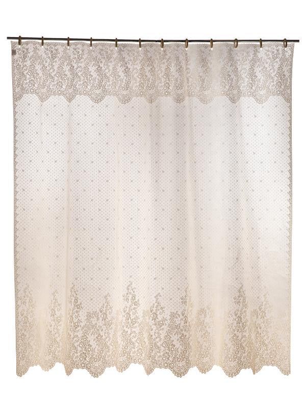 a white shower curtain with lace on it