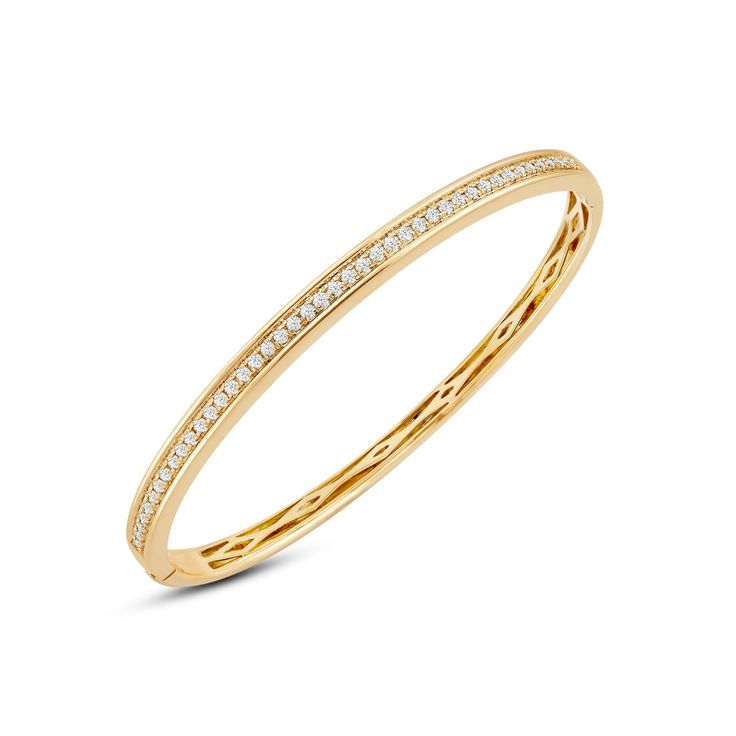 There's power in sparkle. Add this classic bangle to your office ensemble and seal a deal in style. The openable rigid bracelet in yellow gold features a classic diamond pave running along half of the bangle's circumference. This chic piece can easily be paired with almost any of your outfits. Classic Bangles, Gorgeous Engagement Ring, Diamond Bangle, Now And Forever, Love Symbols, Conflict Free Diamonds, High Quality Jewelry, Diamond Gemstone, Diamond Studs