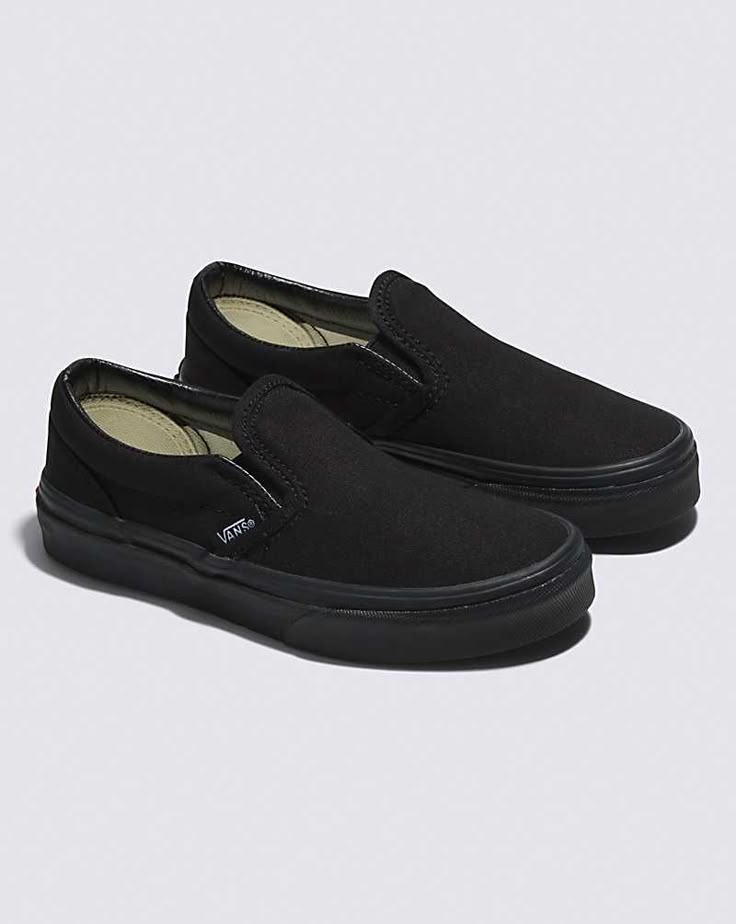 Kids Slip-On Shoe Black Sporty Slip-ons With Rubber Sole, Black Slip-ons With Round Toe For Streetwear, Black Slip-ons For Streetwear, Casual Black Slip-resistant Slip-ons, Casual Slip-ons With Rubber Waffle Outsoles For Streetwear, Black Low-top Slip-ons With Rubber Sole, Black Slip-on Skate Shoes With Rubber Sole, Black Low-top Slip-ons With Vulcanized Sole, Casual Black Skate Shoes With Rubber Toe Cap