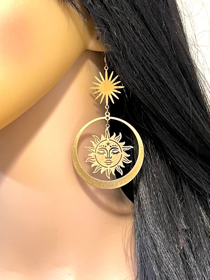 "Long, fashion, celestial, brass, drop/dangle, statement earrings: sun goddess and goddess of shooting stars; \"Novum,\" (aka Alectrona and Asteria). Total drop length: 3.5\" x 1.90.\"" Mystical Gold Earrings With Sun And Moon Design, Celestial Brass Jewelry, Celestial Metal Dangle Hoop Earrings, Celestial Style Metal Dangle Hoop Earrings, Nickel Free Celestial Earrings, Nickel-free Celestial Earrings, Mystical Gold Drop Earrings, Mystical Gold Earrings For Festival, Gold Celestial Metal Earrings