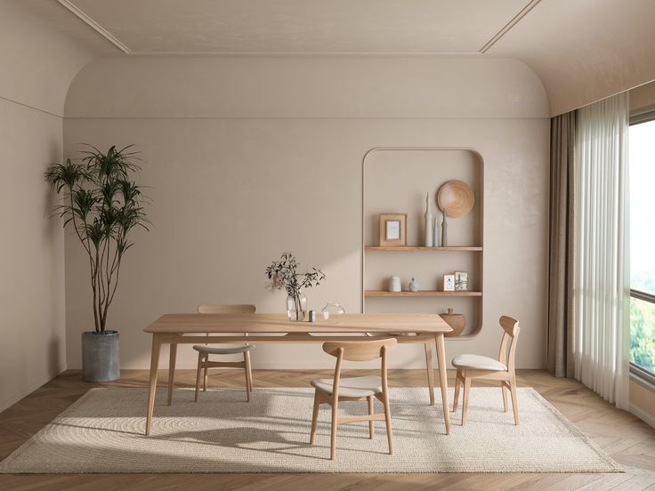 a dining room with a table and chairs