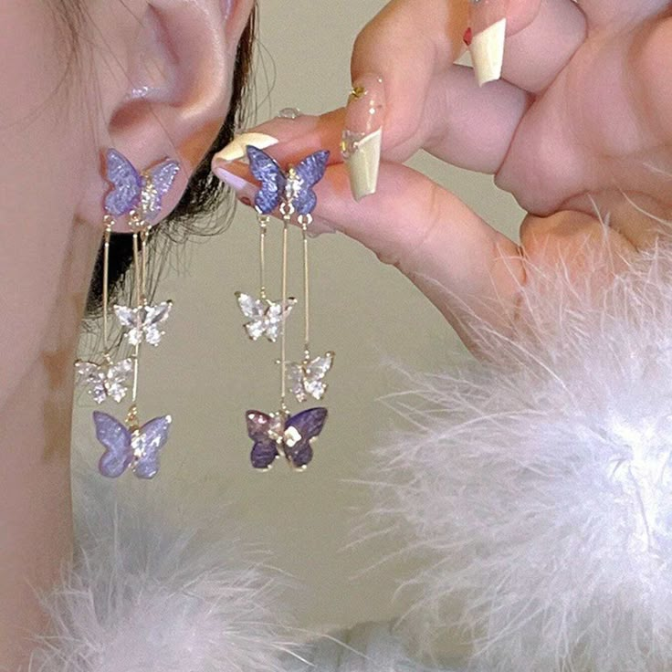 Earrings Purple Butterfly Rhinestone Long Tassel Drop Silver-Tone New Just Over 2" Long 4 Butterflies On Each Earring So Pretty! New In Package Womens Jewelry Trends, Long Tassel Earrings, Luxury Earrings, Tassel Drop Earrings, Fancy Jewellery, Trendy Earrings, Pretty Jewelry, Fancy Jewelry, Purple Butterfly