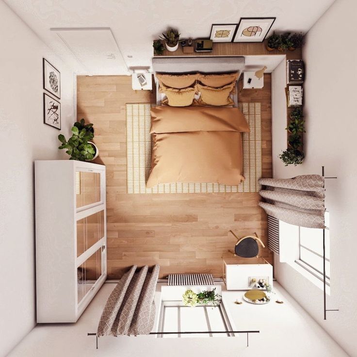 an overhead view of a small bedroom with a bed