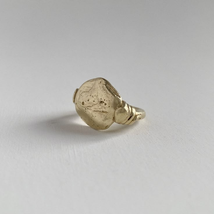 This shape is cast from a rock I found on the beaches of the Pacific Coast. The roundness and irregular shape envelop all the beauty that nature provides. Depending on casting, each rock will look completely unique with its own markings and character. Along the side of the ring, are hand-formed serpents. COMPOSITION 18K Recycled Gold 4 or 6 Ring Size Alternate sizes available upon request Cast Jewelry, Rare Stone, Casting Jewelry, Exclusive Jewelry, Fantasy Jewelry, Pacific Coast, Recycled Gold, Jewelry Inspo, Organic Shapes