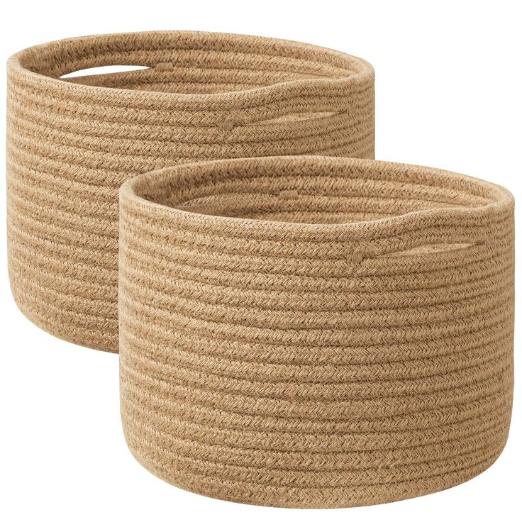 two large round baskets with handles made from jute rope, set on white background