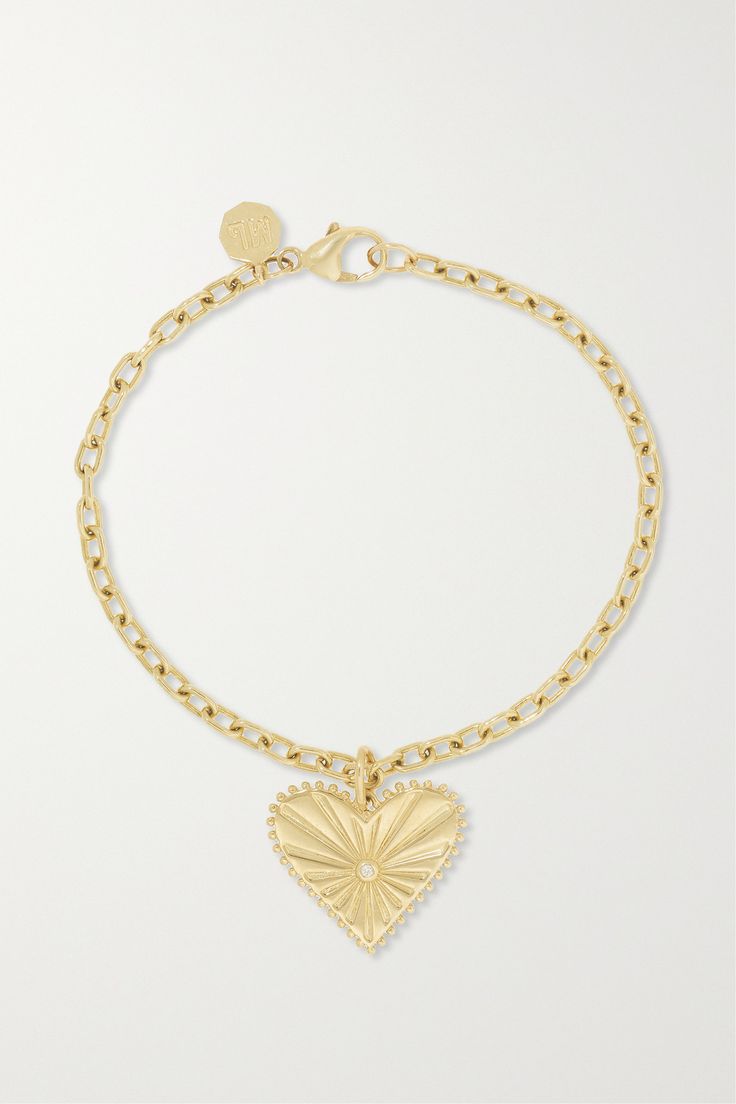 The perfect way to mark an anniversary or special occasion, Marlo Laz's 'Small Pour Toujours' bracelet is engraved with a French expression that translates to 'Forever and Always'. It's crafted from 14-karat gold and suspends a heart-shaped pendant that's intricately etched and encrusted with a single diamond. The slender chain links make it a practical addition to your everyday rotation. Luxury Heart Charm Bracelet For Anniversary, Luxury 14k Gold Heart Bracelet For Valentine's Day, Luxury White Gold Bracelet With Heart Charm, Luxury 14k Gold Bracelet For Valentine's Day, Luxury Gold Bracelet For Valentine's Day Gift, Luxury Wedding Heart Bracelet With Heart Charm, Diamond Gold Bracelet With Polished Finish As Gift, Elegant Engraved Heart Bracelet For Valentine's Day, Luxury Yellow Gold Bracelet For Valentine's Day