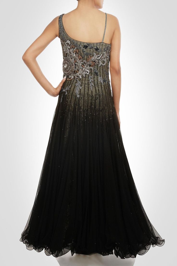 This black color stunning gown is in net fabric having desinger fabric on yoke which is embellished with handwork. Inner layer of net is of satin silk fabric. L Hand Embellished Floor-length Gown For Prom, Hand Embellished Floor-length Prom Gown, Embellished Organza Party Gown, Glamorous Black Dresses For Reception, Black Floor-length Organza Dress, Black Embellished Tulle Gown, Black Ball Gown With Sheer Bodice, Elegant Black Dress For Reception, Black Floor-length Organza Lehenga