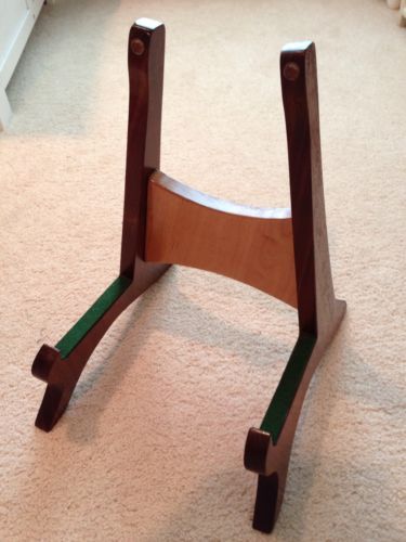 a small wooden chair sitting on the floor