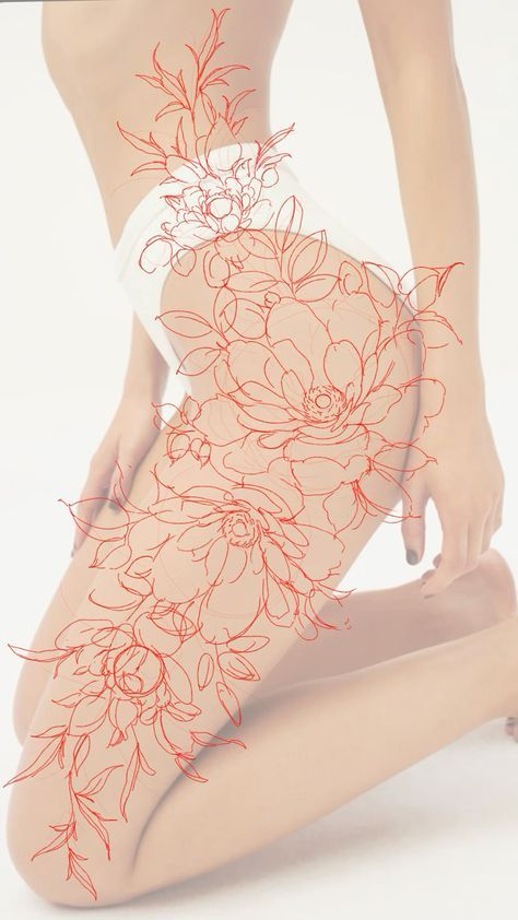 a woman is sitting on the ground with her legs crossed and flowers drawn all over her body