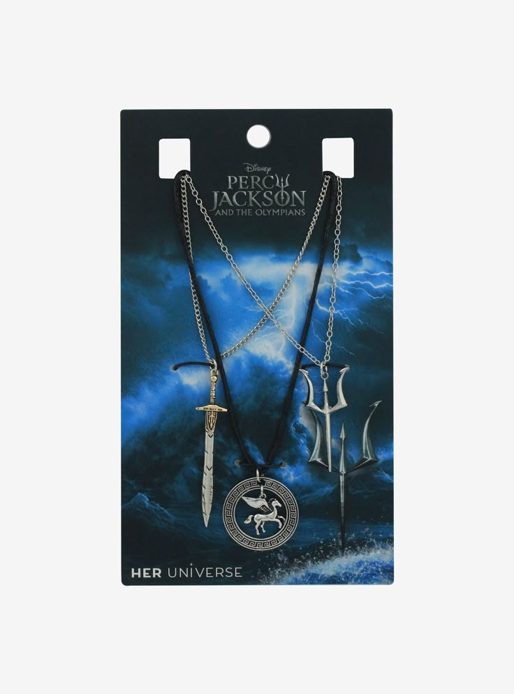 two necklaces in the shape of swords with an image of a man and woman on them