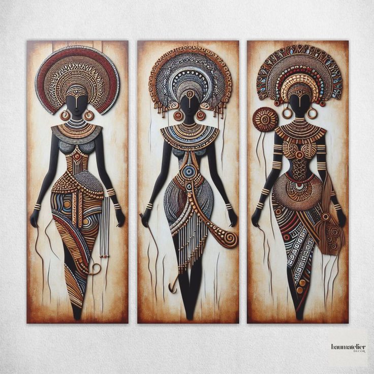 three african art pieces with different designs on them