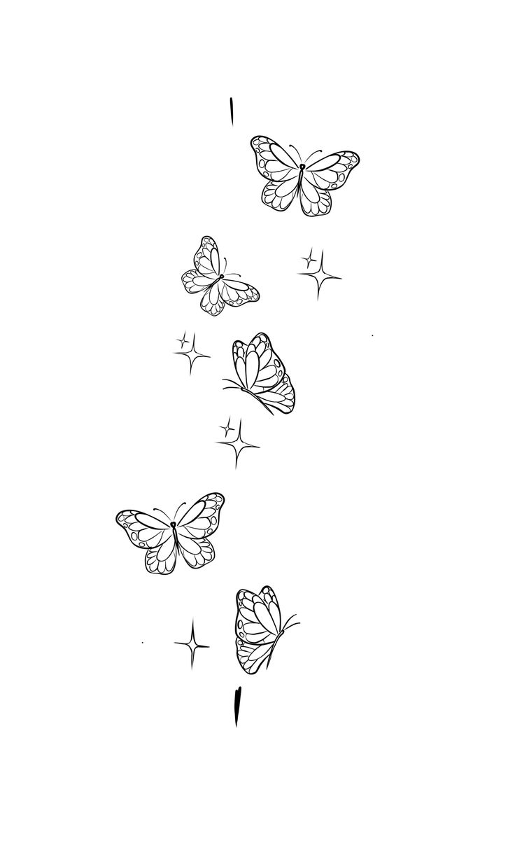 some butterflies flying in the air