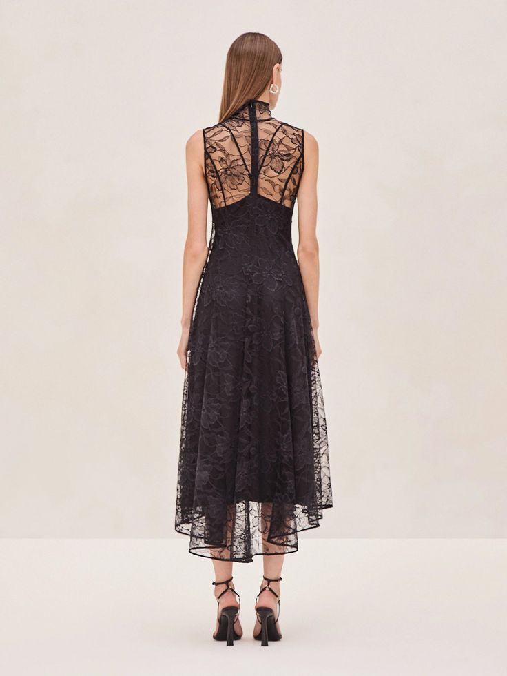 Meet the Rhiane Lace Midi Dress—a blend of elegance and edge that's designed to turn heads. This piece is all about versatility. Wear it with the slip for a more classic, refined look, or without if you're feeling daring. The intricate lace detailing adds a touch of romance, while the sheer fabric keeps things modern and unexpected. Whether you're dressing up for an event or just want to make a statement, Rhiane is your perfect go-to. Elegant Sheer Midi Dress With Fitted Bodice, Chic Formal Midi Dress With Lace Bodice, Chic Evening Dress With Lace Trim, Formal Midi Dress With Lace Trim And Fitted Bodice, Evening Lace Dress With Fitted Bodice, Midi Length, Elegant Lace Midi Dress With Fitted Bodice, Delicate Lace Midi Dress For Formal Occasions, Evening Midi Dress With Lace Trim And Fitted Bodice, Fitted Evening Dress With Delicate Lace