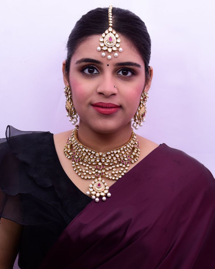 Exotic and snag-free kundan beaded necklace set with earrings. This is a stylish set with White Kundan. This set will work well with traditional, formal, and western formals. Option 1: Red Color (D657) Option 2: White Color (D709) Eye-catching and unique jewelry that will set you apart. Gift this piece to a loved one, and see their face light up with joy. Best for gifting or for personal use, wear it to any occasion and become the spotlight. Chandbali Jewelry Sets For Puja, Diwali Kundan Chandbali Sets, Bollywood Style Formal Meenakari Sets, Festive Kundan Temple Jewelry Sets, Traditional Kundan Sets For Formal Occasions, Traditional Kundan Formal Sets, Festive Chandbali Jewelry Sets For Puja, Elegant Kundan Necklace With Meenakari For Puja, Elegant Heavy Jewelry Sets For Navratri