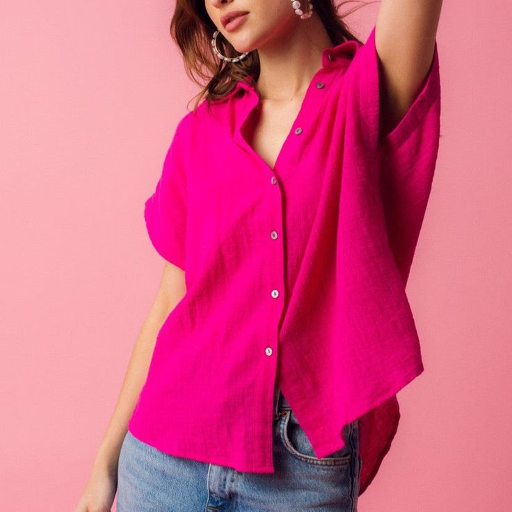 Stay stylish and comfortable with our light and effortlessly chic Charlotte Gauze Shirt, featuring short sleeves and button details. Woven Gauze Top: 100% Cotton Color: Fuchsia Relaxed Fit Model's Measurements: Height 5'7.5 | Bust 32 | Waist 25 | Hips 34 | Size S Casual Short Sleeve Top For Summer Daywear, Summer Shirt With Button Closure And Shirttail Hem, Spring Rolled Sleeve Short Tops, Short Sleeve Tops With Rolled Sleeves For Spring, Summer Daywear Blouse With Rolled Sleeves, Summer Blouse With Rolled Sleeves For Daywear, Spring Short Sleeve Tops With Button Closure, Short Sleeve Tops With Button Closure For Spring, Solid Short Sleeve Shirt With Button Closure For Spring