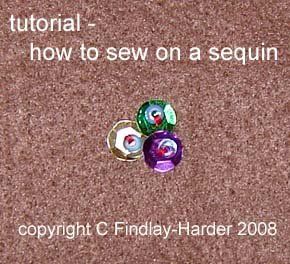 an overhead view of some colorful buttons on the ground with text that reads, how to sew on a sequin? copyright c friday - harder 2008