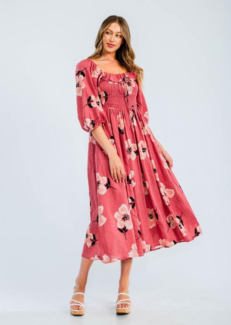 Easy floral midi dress featured in a flowy silhouette with a smocked bodice and volume sleeves. Cotton voile, textured fabrication  Relaxed fit  Side pockets -Contents 70%Cotton 30%Rayon Approximate measurements are as follows Small: Length:48 3/4 " Bust: 29"- 49"  Waist: 28- 48" Medium: Length:49 1/4" Bust:31"-51"    Waist 30- 50"  Large: Length:49 3/4" Bust:33"-53" Waist 32 -52" Chic Square Neck Ditsy Floral Dress, Bohemian Ruched Maxi Dress For Garden Party, Chic Ditsy Floral Print Dress With Square Neck, Chic Floral Dress With Square Neck And Ditsy Print, Chic Square Neck Floral Dress With Ditsy Print, Square Neck Floral Dress For Day Out, Smocked Bodice Mid-length Maxi Dress, Knee-length Floral Dress With Ruffles For Vacation, Chic Ditsy Floral Print Dress For Brunch