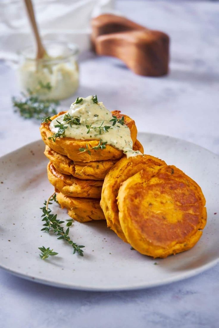 some food is sitting on a white plate