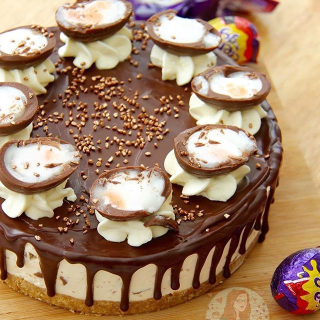 there is a cake with chocolate and marshmallows on it