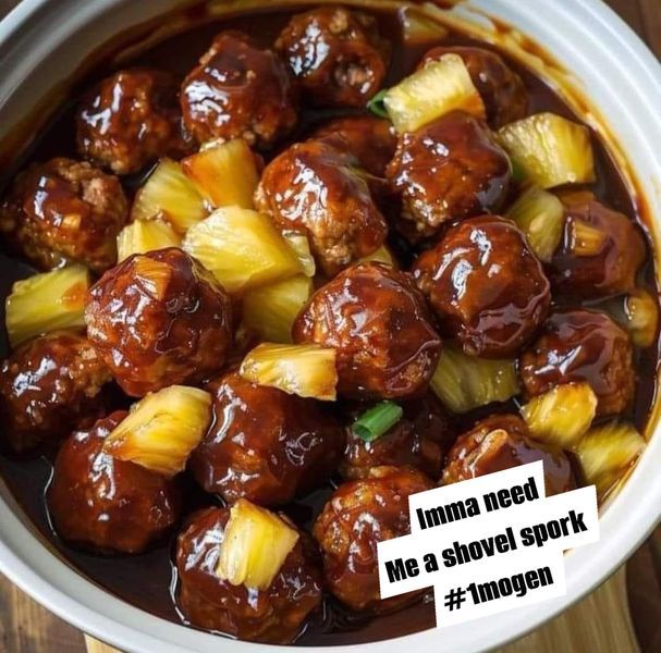 meatballs and pineapples are in a bowl on a wooden table with the words mmm need me a shovel