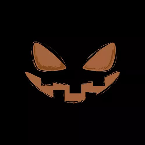 an orange pumpkin face on a black background