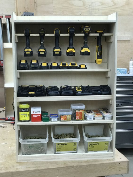 a workbench with tools and other items on it