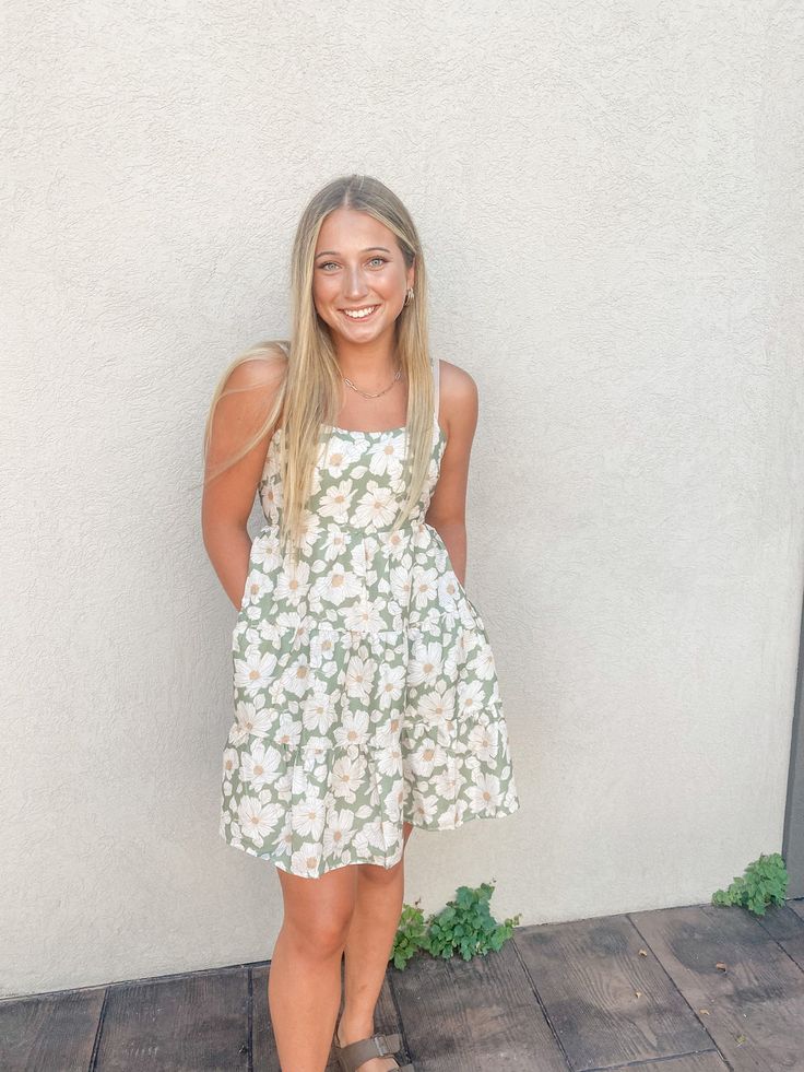 Green and ivory floral mini dress Casual Floral Dress With Smocked Bodice For Spring, Casual Floral Print Smocked Dress, Casual Floral Dress With Smocked Bodice For Vacation, Mini Length Smocked Back Dress For Vacation, Mini Dresses With Smocked Back For Day Out, Mini Dresses For Day Out With Smocked Back, Floral Square Neck Sundress For Day Out, Square Neck Floral Sundress For Day Out, Casual Floral Dress With Smocked Back For Brunch