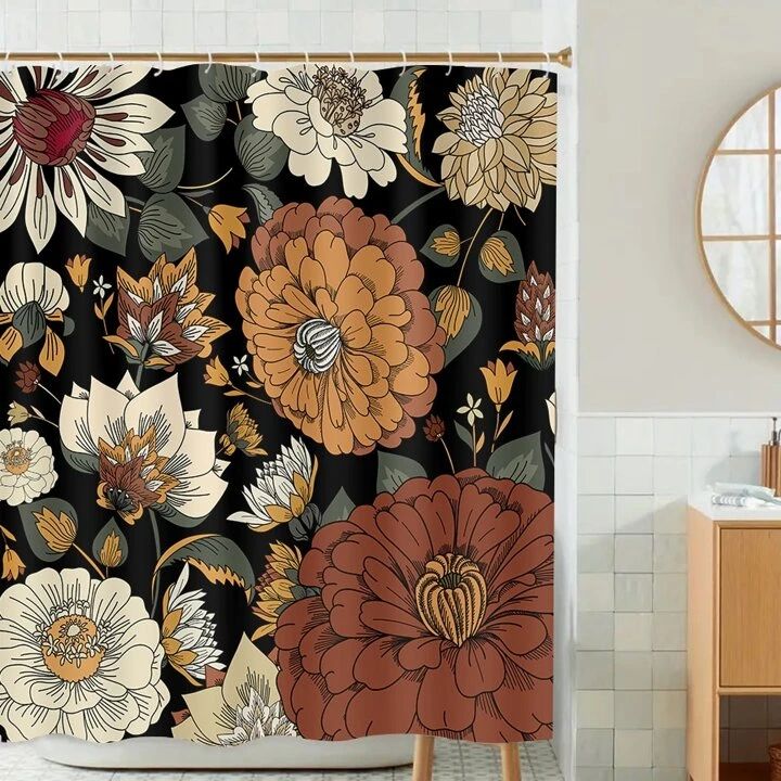 a bathroom with a black shower curtain and white tile flooring that has colorful flowers on it