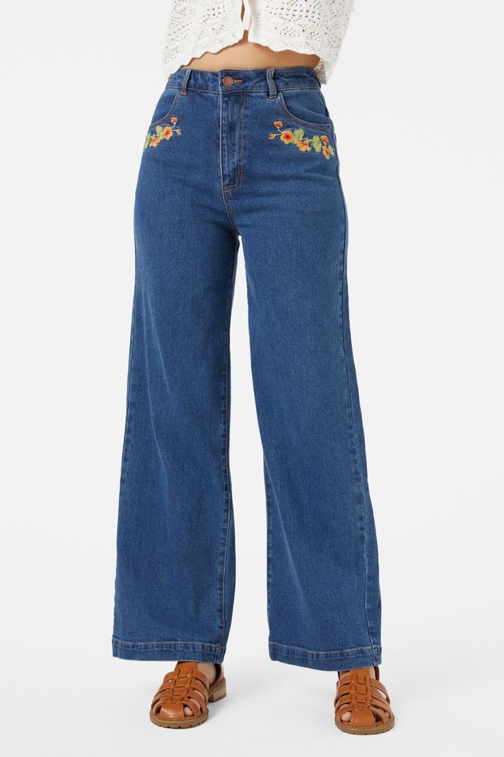 Floral embroidered straight leg jean, featuring gorgeous hand painted nasturtium flowers - Nasturtim mbroidery along front pockets and back yoke- high waisted style- relaxed fit through the leg- front fly with button closure- curved front pockets- patch pockets on back - comfortable cotton elastane denim- available in mid denim Product Code: PGFY272