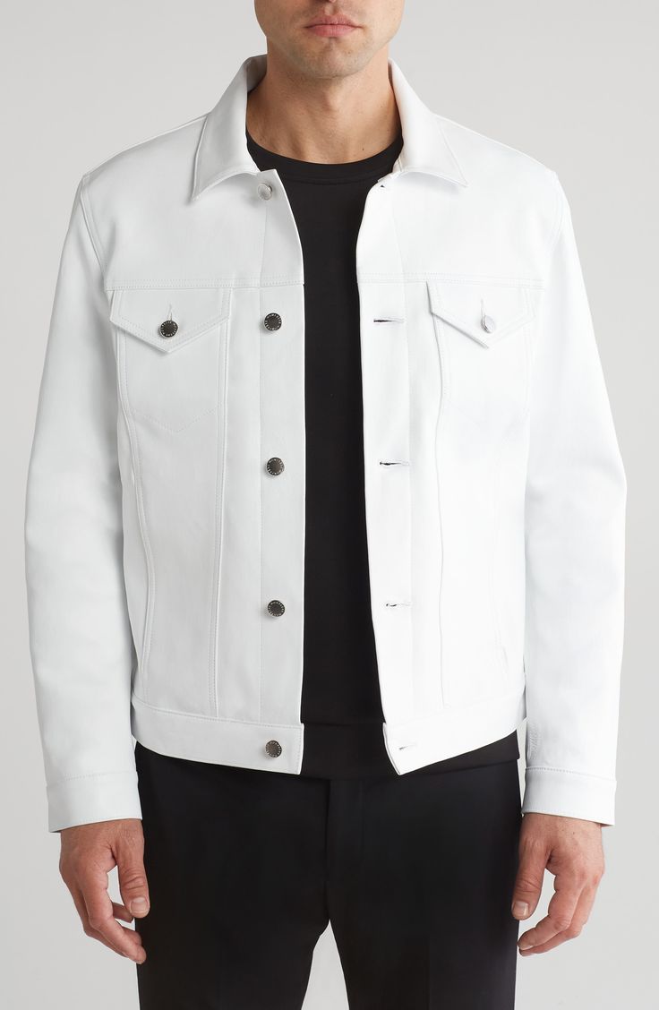 Make a clean, striking statement with this bright-white leather jacket in a casual-cool trucker profile. 26" length (size Medium) Front button closure Spread collar Button cuffs Chest button-flap patch pockets; front welt pockets Lined Leather Professional leather clean Made in the USA White Leather Jacket With Pockets For Work, White Fitted Leather Outerwear, Fitted White Leather Outerwear, Luxury White Outerwear With Lapel Collar, White Leather Long Sleeve Outerwear, Designer White Outerwear With Buttons, Classic White Leather Jacket With Long Sleeves, White Button-up Outerwear With Snap Buttons, Classic White Long Sleeve Leather Jacket