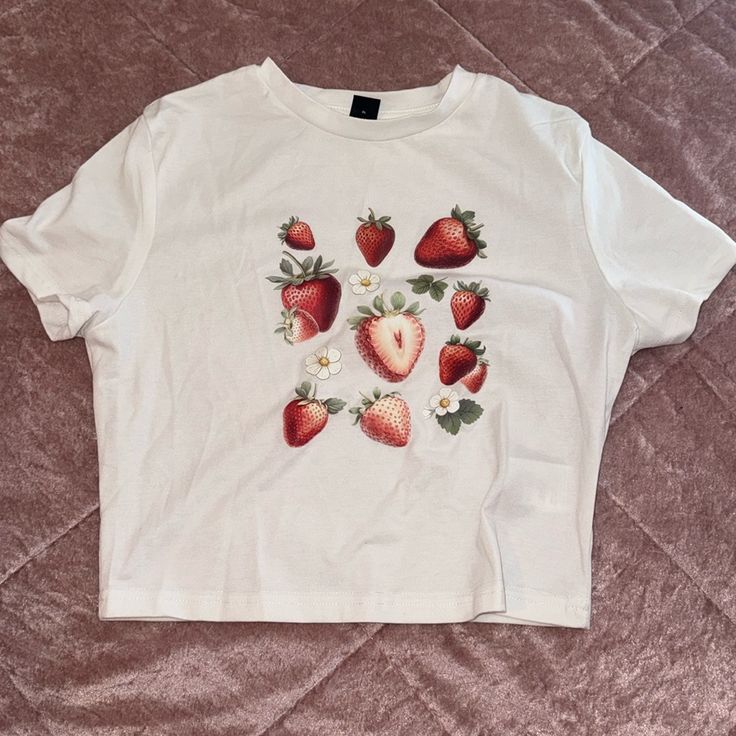 Never Worn Shein Strawberry Baby Tee In A Size Medium. Perfect Condition With No Rips/Tears/Stains. Fitted White Print Top For Summer, Spring Strawberry Print Crew Neck Top, Spring Crew Neck Top With Strawberry Print, Summer Strawberry Print Short Sleeve Tops, Strawberry Print Cotton Graphic Tee, Cotton Strawberry Print Graphic Tee, White Printed Cotton Tops, White T-shirt With Strawberry Print For Spring, Fitted Strawberry Print T-shirt For Summer