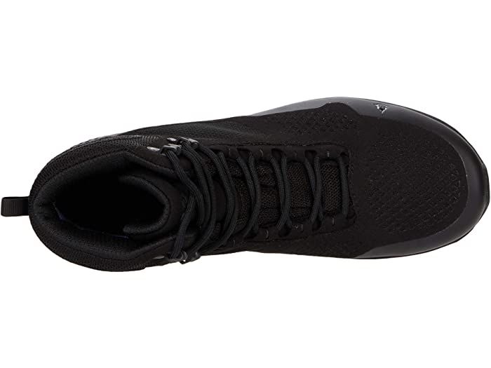 black sneakers with laces on the upper part of the shoe, and an insulated sole