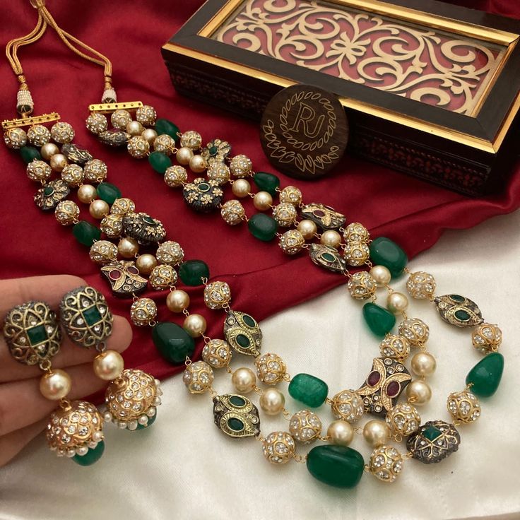 Most eligible gift for someone you love. Inspired by the Nizam of Hyderabad this set has Fine quality Emerald Green, ruby red onyx and Kundan semiprecious beads long necklace with earrings Necklace Length: 19 inches Highest quality and craftsmanship You can ask questions on Email ID: vijaygarg579vg@gmail.com Indian Long Necklace, Bridal Jewelry Indian, Bridal Jewellery Online, Semi Precious Stone Jewelry, Unique Gold Jewelry, Indian Choker Necklace, Unique Gold Jewelry Designs, Indian Choker, Gold Jewelry Designs