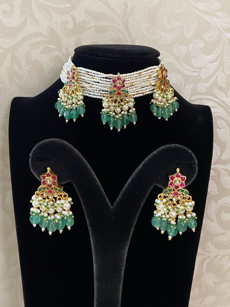 Handmade ahamadabadi kundan motifs pearls choker with earrings Traditional Pearl Drop Choker Necklace, Traditional Festive Pearl Choker Necklace, Traditional Bridal Pearl Choker Necklace, Traditional Pearl Drop Choker, Traditional Pearl Drop Beaded Necklaces For Festivals, Festive Pearl Drop Beaded Necklaces, White Kundan Choker Necklace In Temple Jewelry Style, Pearl Kundan Choker Necklace For Gift, Traditional Pearl Chain Choker For Gift