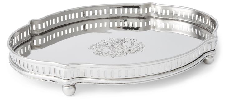 The distinctively detailed design of this Chippendale-style tray brings a tastefully elegant presentation when serving canapes or drinks to your guests, or holding glassware on your bar. Also lends a sophisticated look to your bedroom when used as a vanity tray on your dresser. Measures 11.75 inches wide x 9.25 inches long x 1.5 inches high. Made from stainless steel. Glass Tray Decor, Guest Towel Tray, Round Hanging Mirror, Polished Chrome Bathroom, Acrylic Monogram, Bathroom Vanity Tray, Towel Tray, Elegant Presentation, Cottage Bathroom