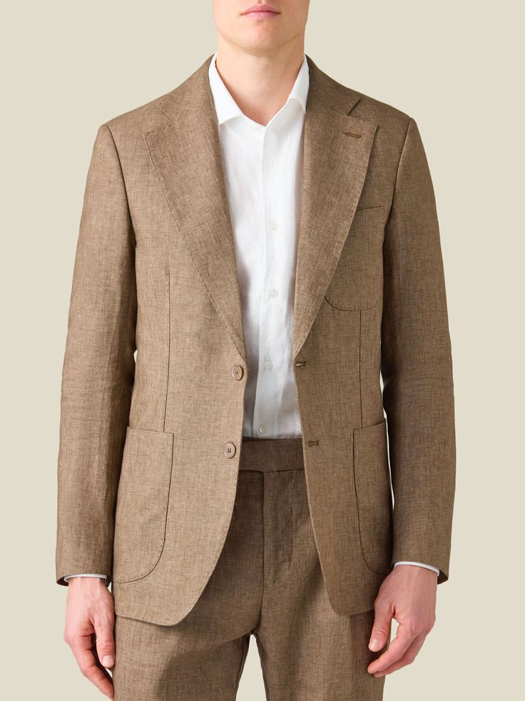 Crafted in Northern Italy from 100% pure linen, treated to obtain a unique natural stretch for breathability and comfort. Designed with a single-breasted 2-button closure, fine sartorial details and a tailored profile for an elegant look.     Cut in a slim yet comfortable fit, this elegant suit jacket has an unstructured profile and is half lined for lightness and a relaxed appeal. Artisanal details like AMF stitching and sartorial details like the notch lapel and patch pockets make this blazer Luxury Linen Suits With Lapel Collar, Business Linen Blazer With Concealed Placket, Timeless Linen Blazer For Business Casual, Classic Linen Suits For Workwear, Semi-formal Linen Blazer With Notch Lapel, Linen Suits With Lapel Collar For Office, Linen Blazer With Pressed Crease For Office, Tailored Linen Blazer With Welt Pockets, Linen Blazer With Welt Pockets For Professional Wear