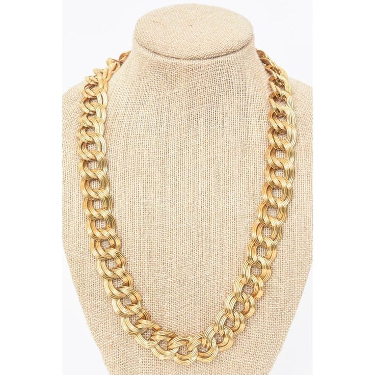 This is part of Chairish’s Costume Jewelry assortment.  This substantial gold plated link necklace has a metal tag that says Dugal. It has good weight and looks great on the neck. It is 12" H or Long. x  each side of links 1" W. This is from the 90's. This is a classic look. Metal Figaro Chain Necklace With Oval Link, Gold-tone Chunky Chain Link Jewelry, Gold Metal Cuban Link Necklace, Gold Metal Cuban Link Chain Necklace, Metal Cuban Link Necklace With Lobster Clasp, Classic Gold Necklace With Chunky Chain, Gold-tone Cuban Link Metal Necklace, Gold-tone Metal Necklaces With Rectangular Links, Classic Metal Necklace With Chunky Chain