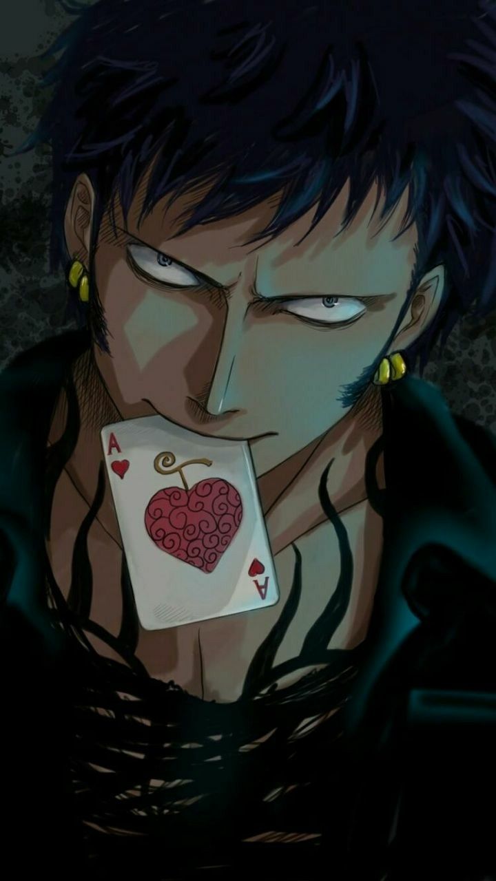 an anime character holding a playing card in his hand